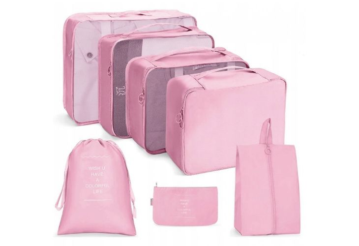 kerst kamperen vrouw packingcubes roze
